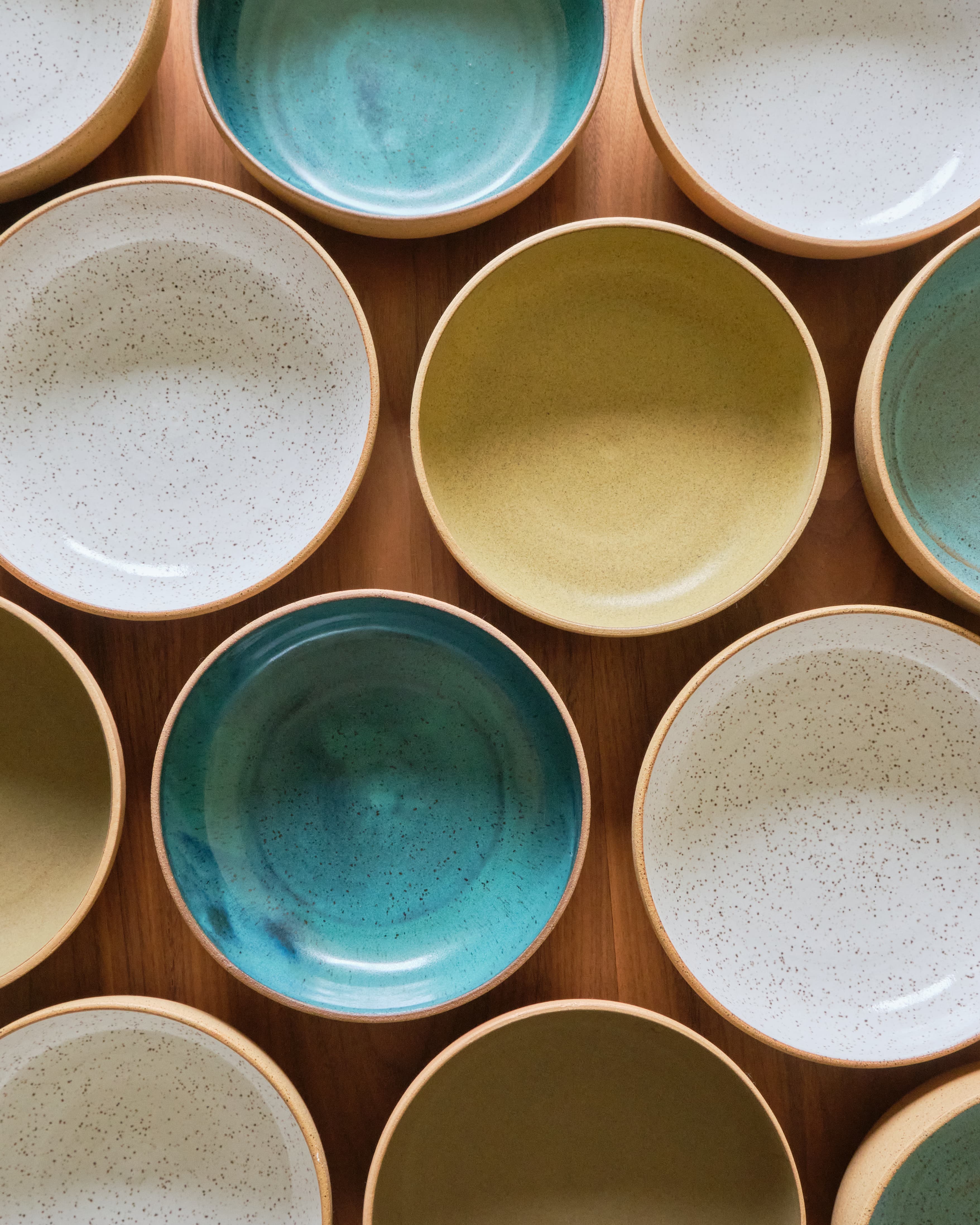 Handmade ceramic plates photographed from above